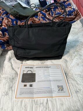 Authentic Prada Black Nylon Tote Bag comes with COA.